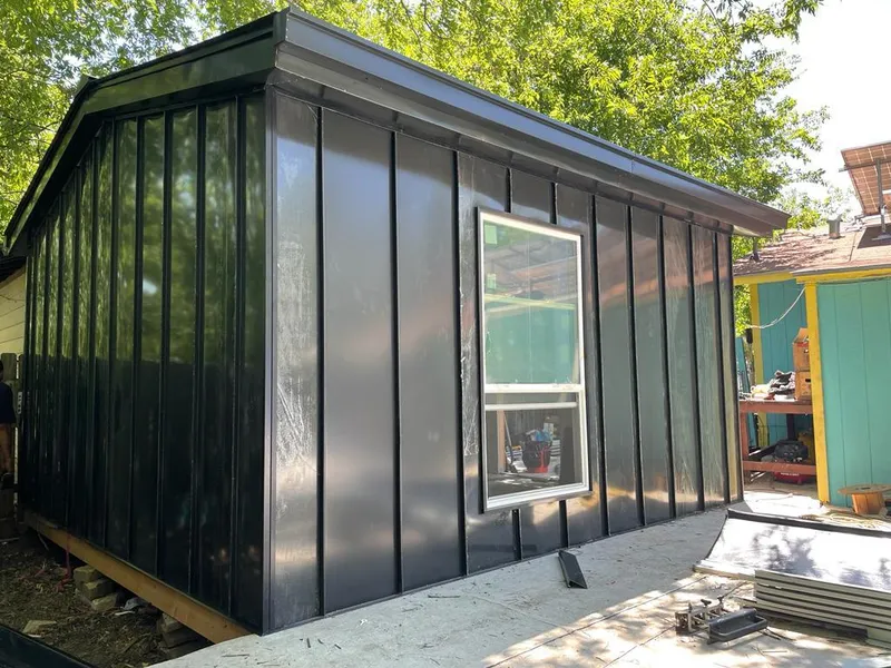 Black standing seam metal wall panels for Metal Roof Installation in Beverly