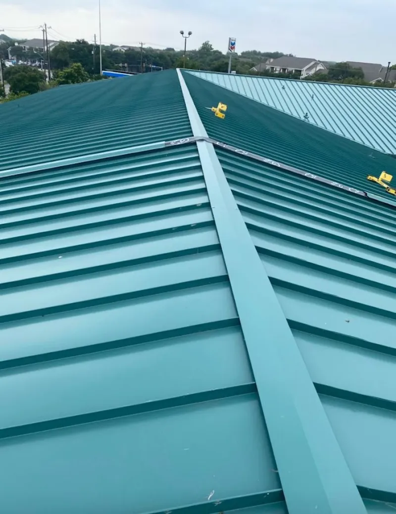 Green commercial metal roof ridge and valley for Metal Roof Repair in Beverly